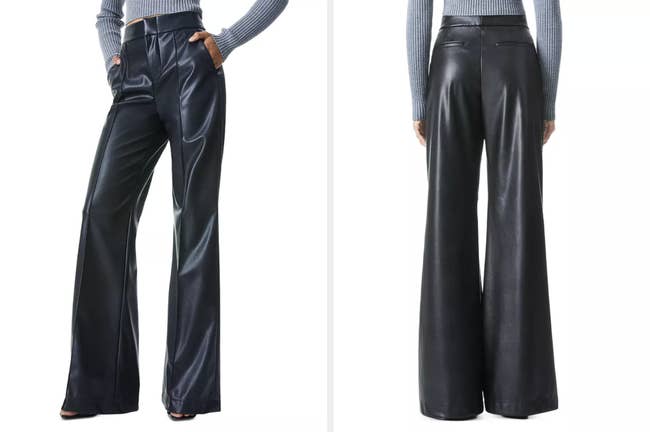 Model wearing black pleated wide leg faux leather pants with ribbed sweater, back view of product on model with trouser styled back pockets