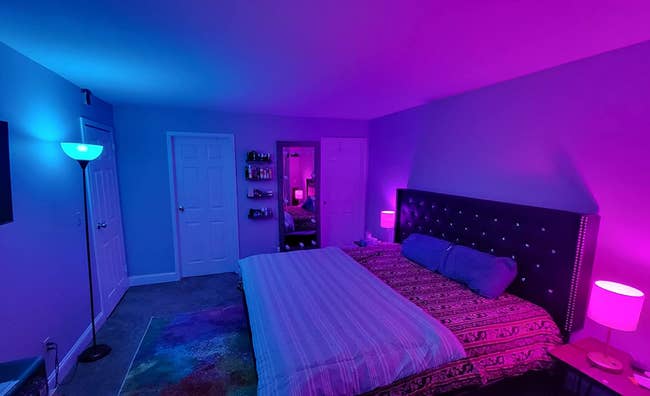 bedroom with color changing bulbs installed in the lamps