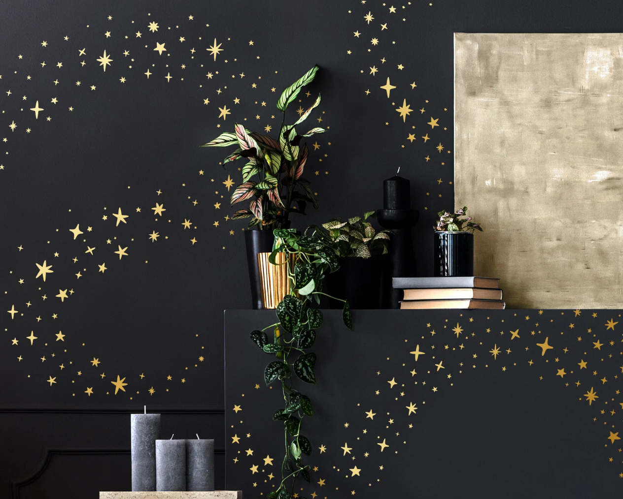 Golden star decals on a black wall