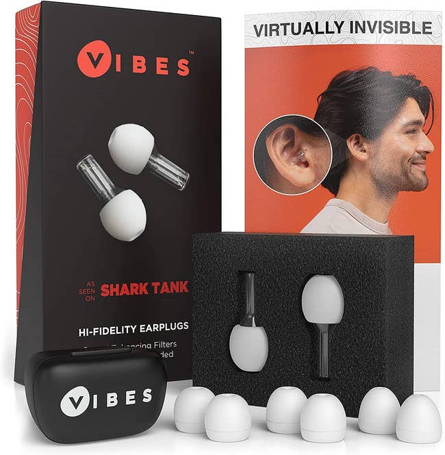 vibes earplugs set showing the multiple tips and the invisibility of them in a model's ear