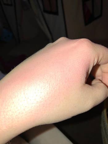 image of the glittering rose blush swatched on a reviewer's hand