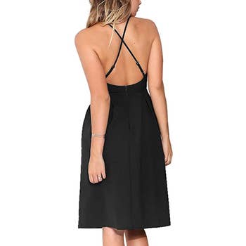 the back of the dress with the criss crossed straps