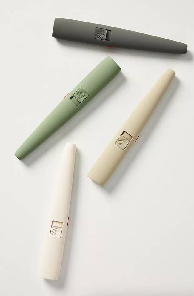 the silicone lighters in cream, beige, green, and gray