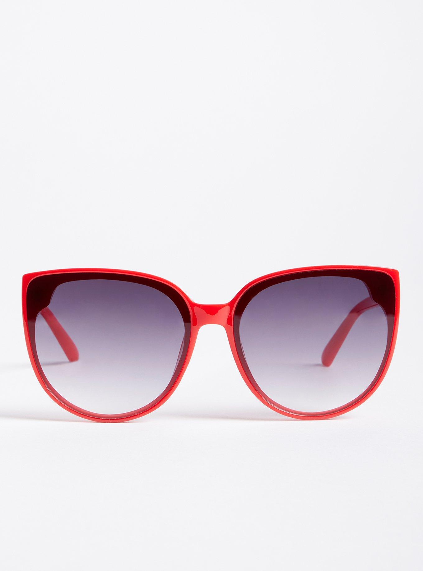 Chic oversized reddish  cat-eye sunglasses with gradient lenses, perfect  for a bold manner  statement