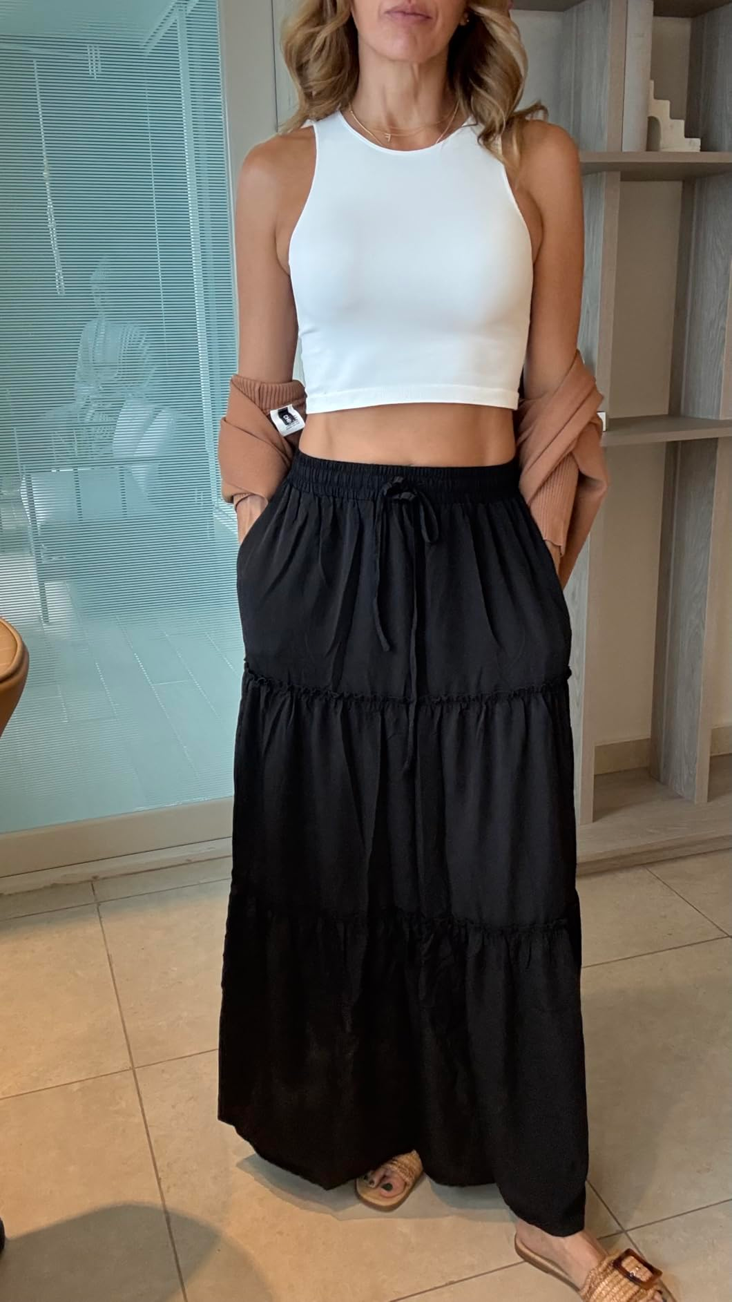 reviewer wearing the skirt successful  black