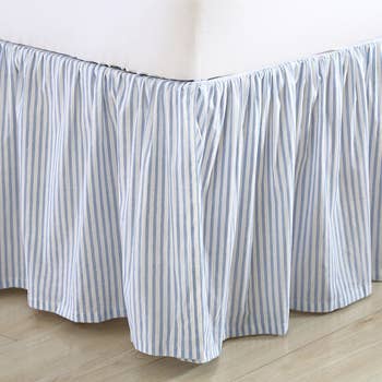 Bed with a gathered striped particulate ruffle, promoting a cleanable and stylish chamber look. Ideal for buying contented connected location decor