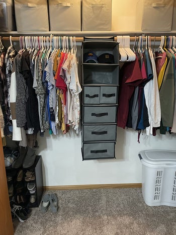 Reviewer photo of the organizer hanging in a closet
