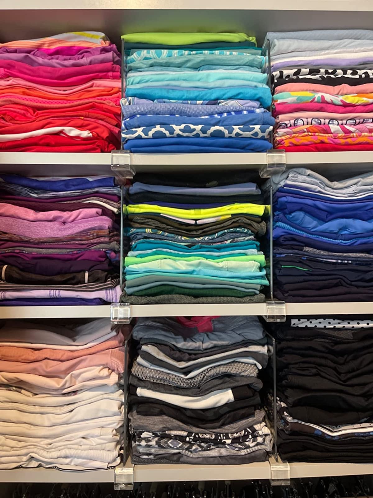 Colorful assortment of shirts, neatly organized