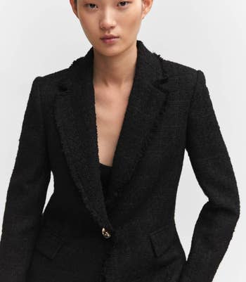 Model in a black blazer