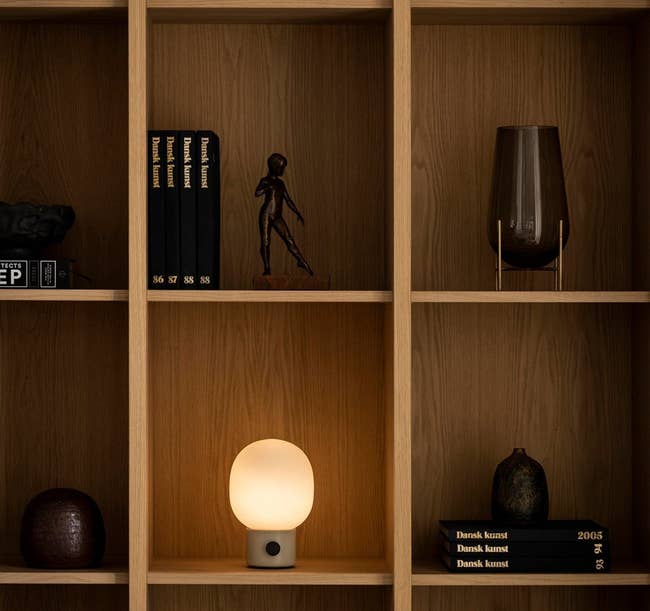 the wireless lamp on a bookshelf