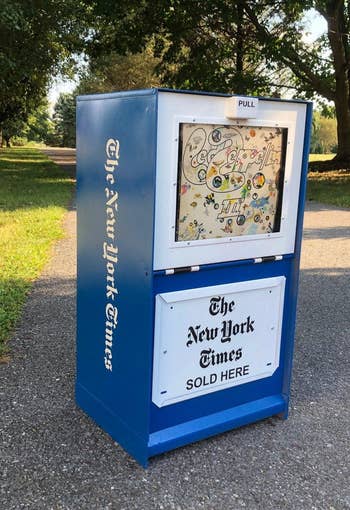 refurbished New York Times newspaper box holding Led Zepelin record