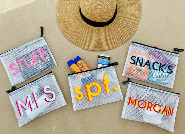 set of customized pouches with snacks, MLS, spf, morgan, and snacks written on them