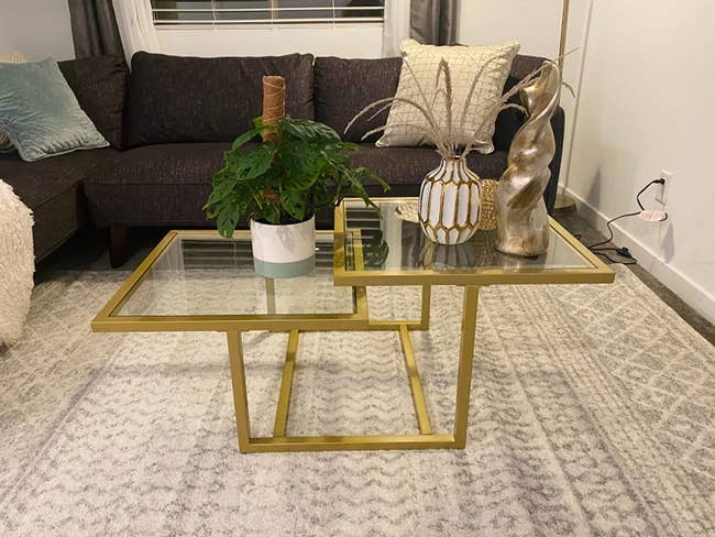 reviewer image of the gold colored 2-tier coffee table