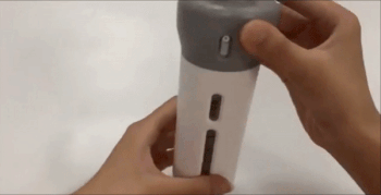 gif of the grey dispenser being opened to show how there are four smaller containers inside you can fill with products