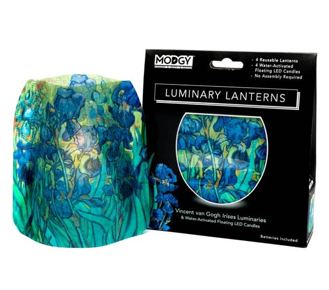 Green, blue, and yellow floral painted printed lantern next to black packaging