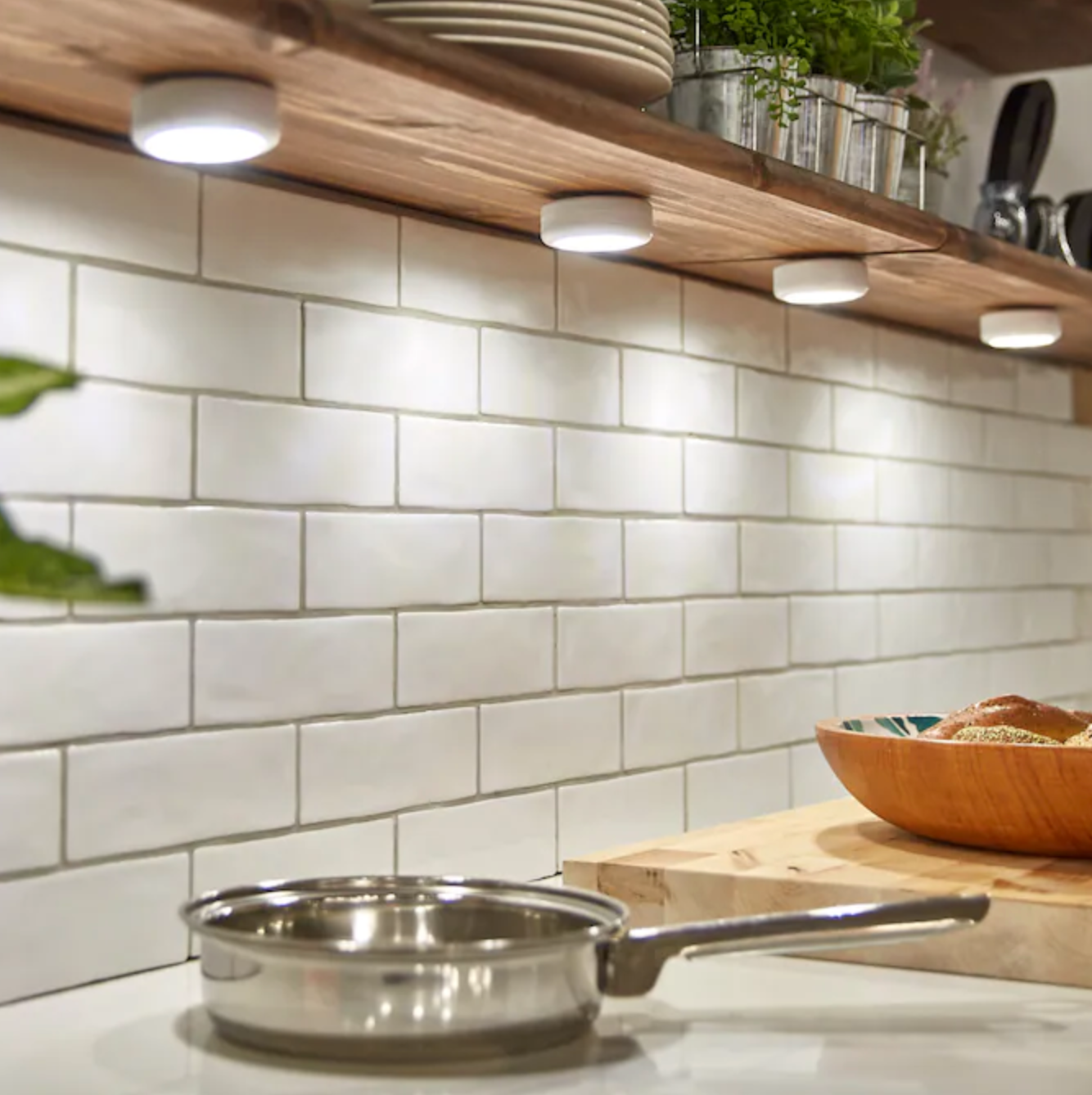 cabinet lights turned on in a kitchen