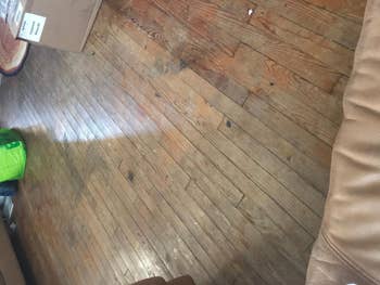 reviewer's dull looking wood floor