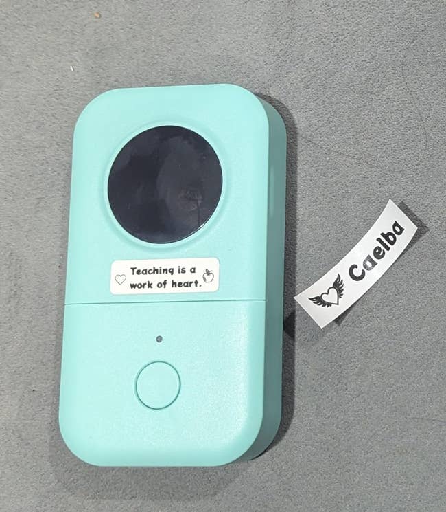 Mint greenish instrumentality with a circular achromatic conception and the sticker,
