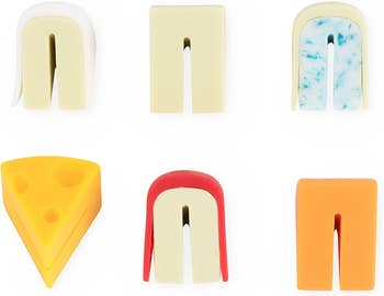 six charms each shaped like a different kind of cheese