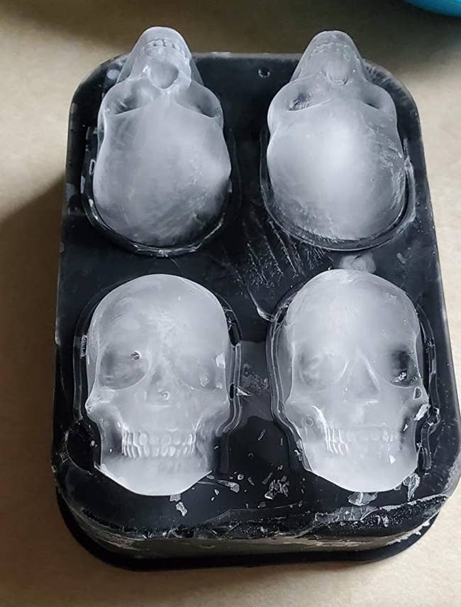 Ice shaped like skulls in a reviewer's mold 