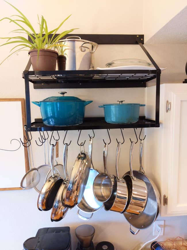 reviewer photo of hanging rack holding pots and pans