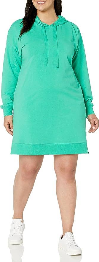 model in green above the knee dress