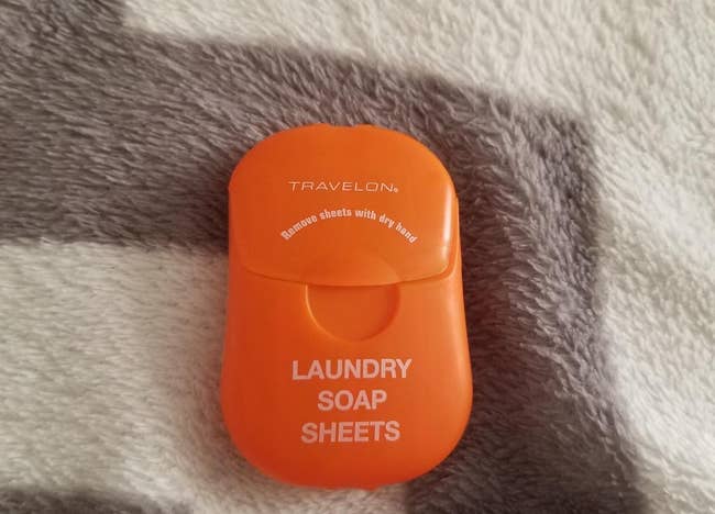 reviewer image of the orange laundry soap sheets