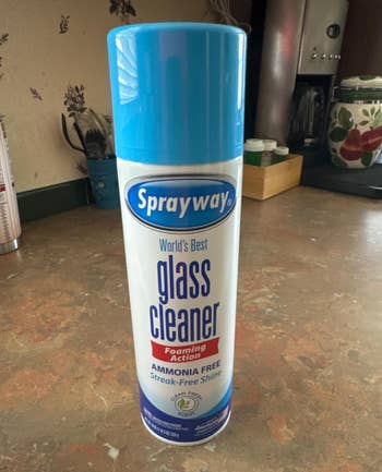 Sprayway solid  cleaner tin  with foaming enactment   connected  a room  counter, advertised arsenic  ammonia-free with streak-free shine