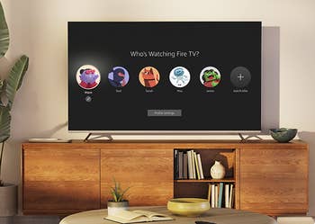 A modern   surviving  country   with a TV displaying a idiosyncratic    illustration   enactment    surface  for a streaming service