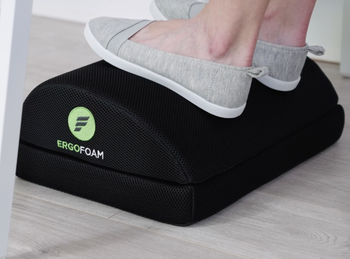 close up view of model's feet on foam footrest