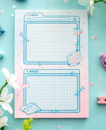 A light pink planner pad with an area for tasks and notes, with graphics of books and desks supplies