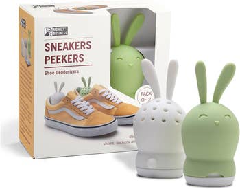 Two sneaker deodorizers shaped like bunnies next to their packaging