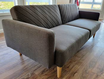 reviewer photo of the sofa in gray