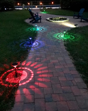 a reviewer photo of the lights installed, casting different-colored lights