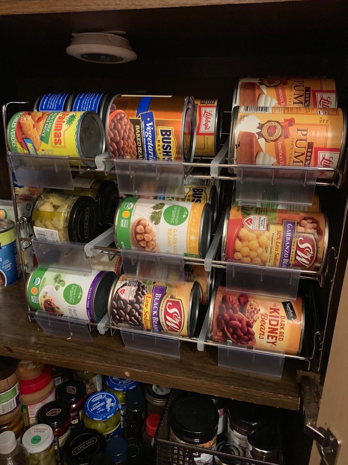 a reviewer's rack holding black beans, pie filling, and enchilada sauce