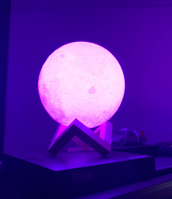 the moon lamp glowing pink