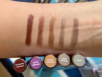 Arm with swatches of five eyeliner shades