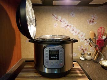 an instant pot with the lid open