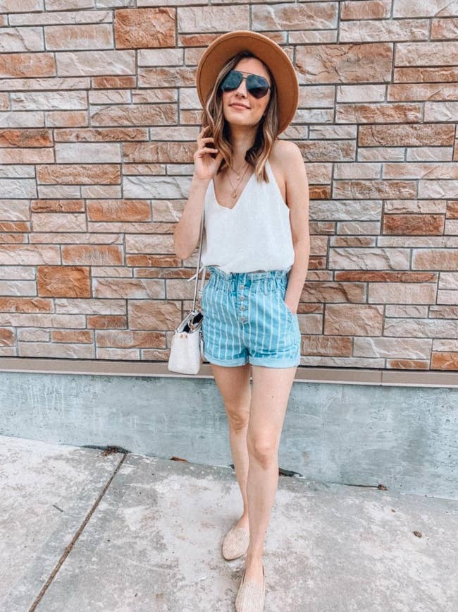reviewer wearing achromatic cami