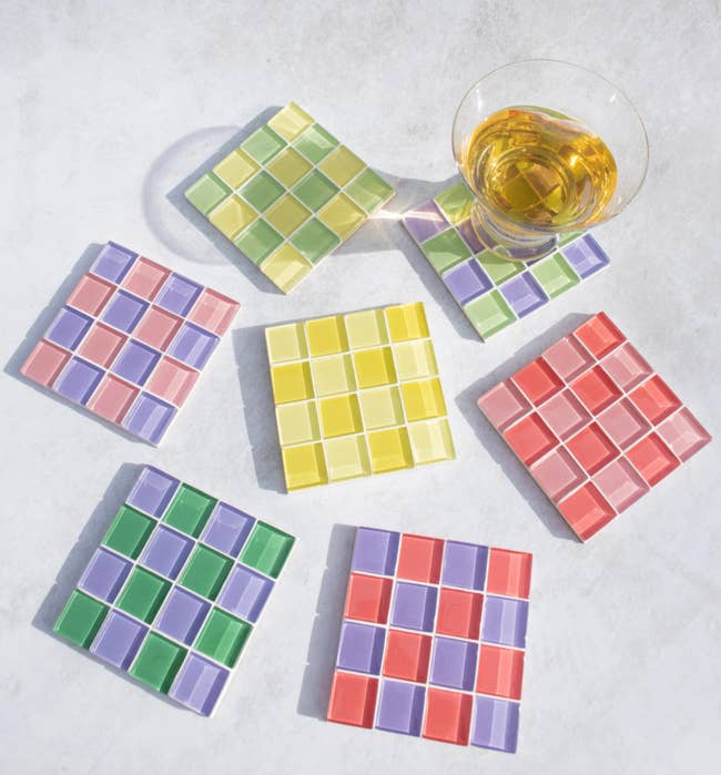 colorful tile square coasters on table