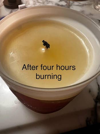 Candle aft  4  hours of burning, showing an adjacent    wax aboveground  with substance   indicating pain  time. Suitable for nonfiction  categorized arsenic  Shopping
