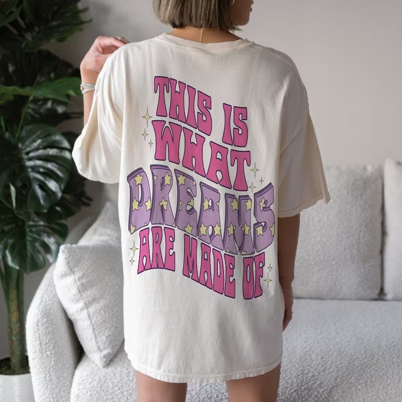a model on an oversized tee that says 