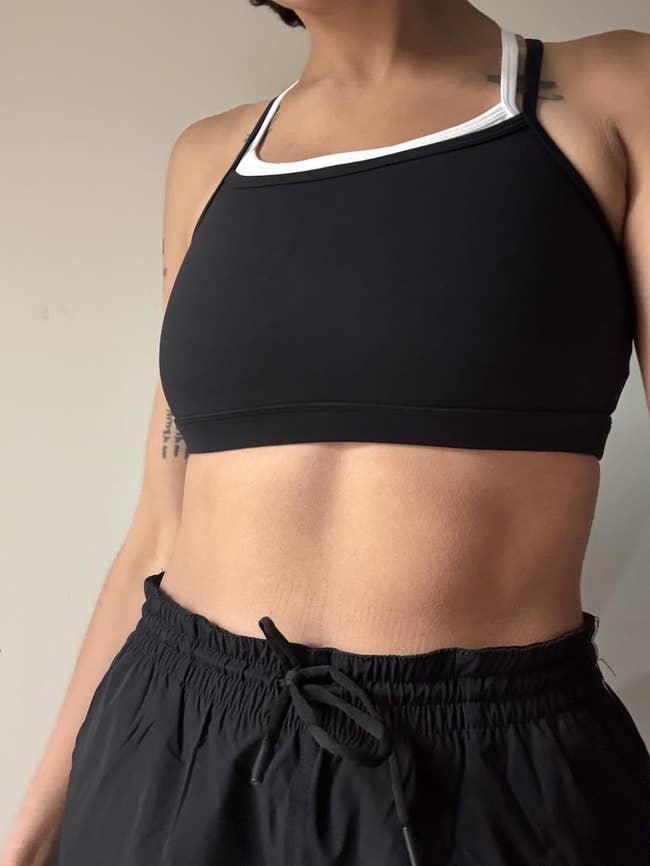 A adjacent up of a reviewer wearing the bra