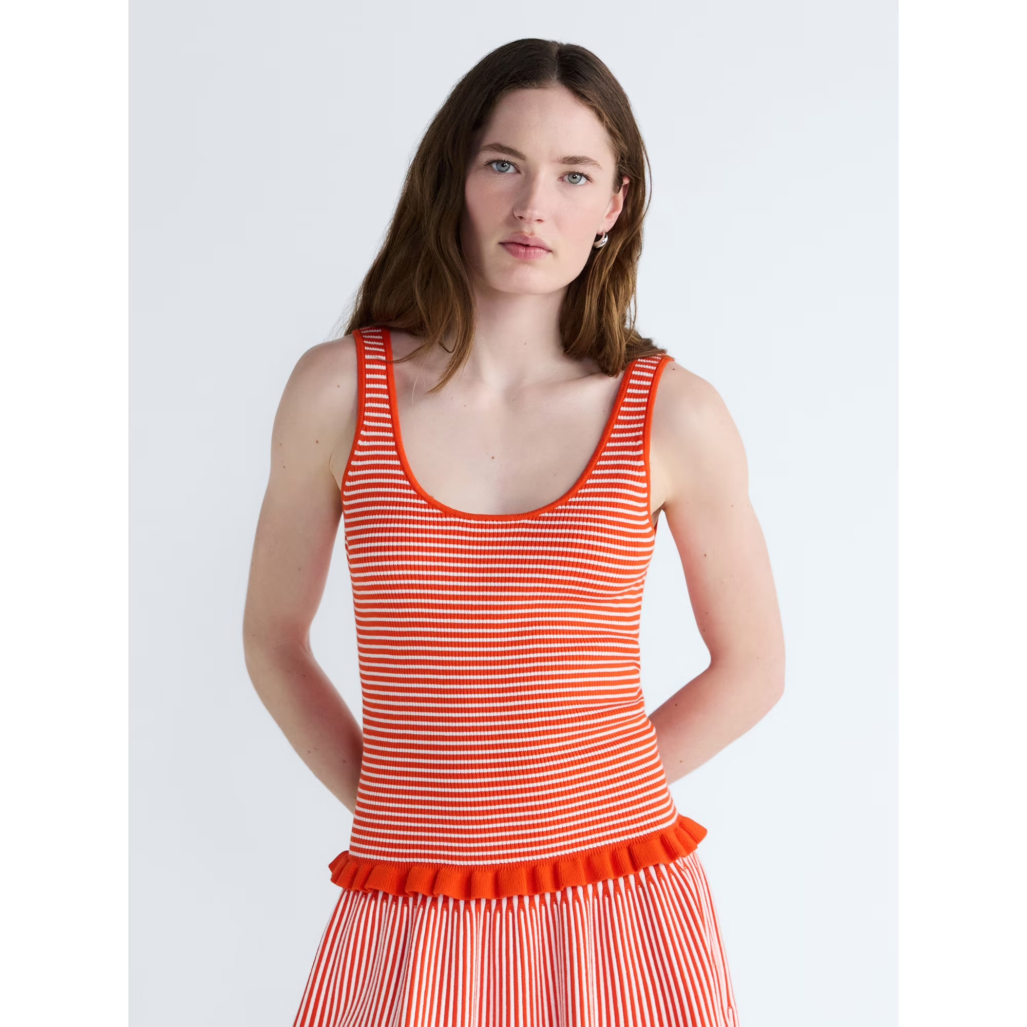 A exemplary  wearing the top