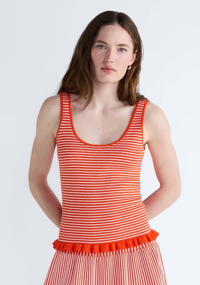 A exemplary wearing the top