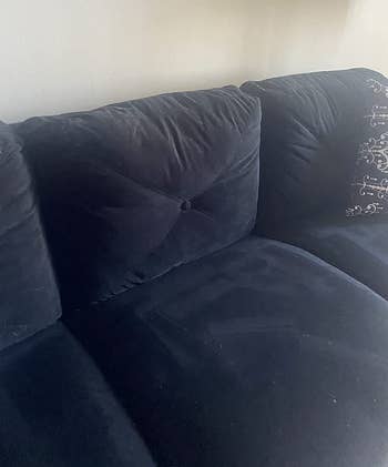 reviewer after image of the same black couch now free of fur