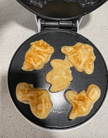 waffles with dino shapes cooking 
