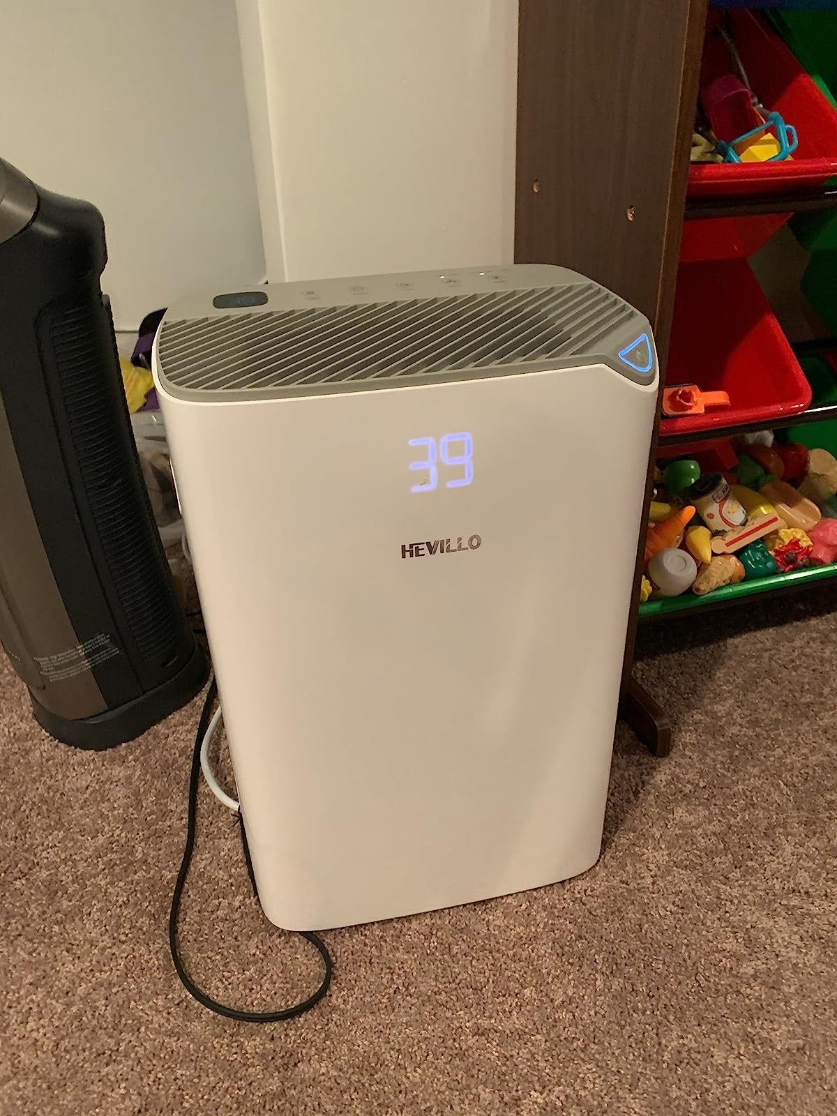 reviewer image of the dehumidifier in a living area