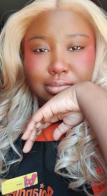 reviewer with glowy blush connected their face