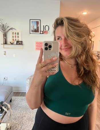 writer ali wearing bra in mojito in a mirror selfie